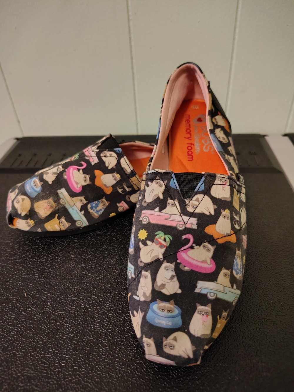 BOBS from Skechers Black Cat-Pattern Slip-On Flats with Pink Lining
